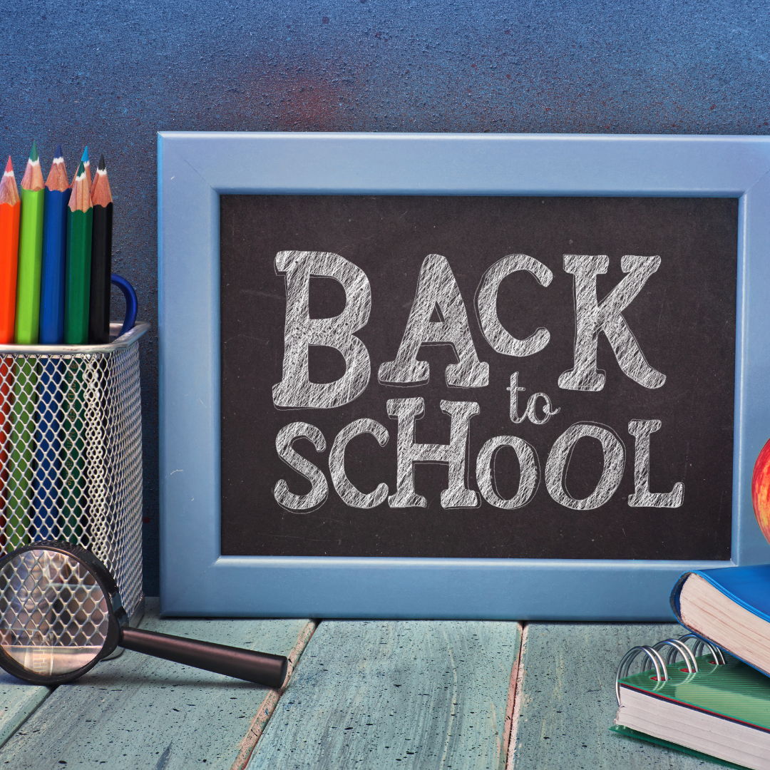 Back to school written on a black board in capital letter